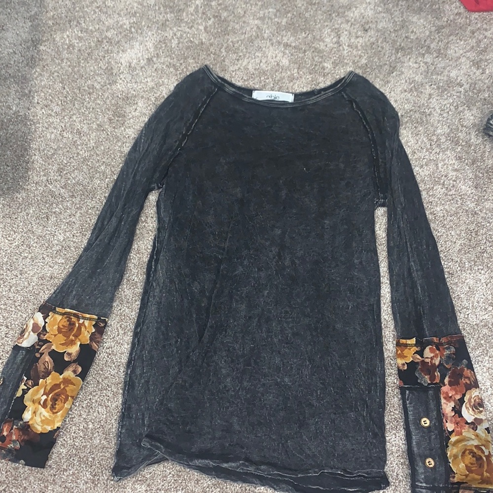 Gray and floral long-sleeve blouse.